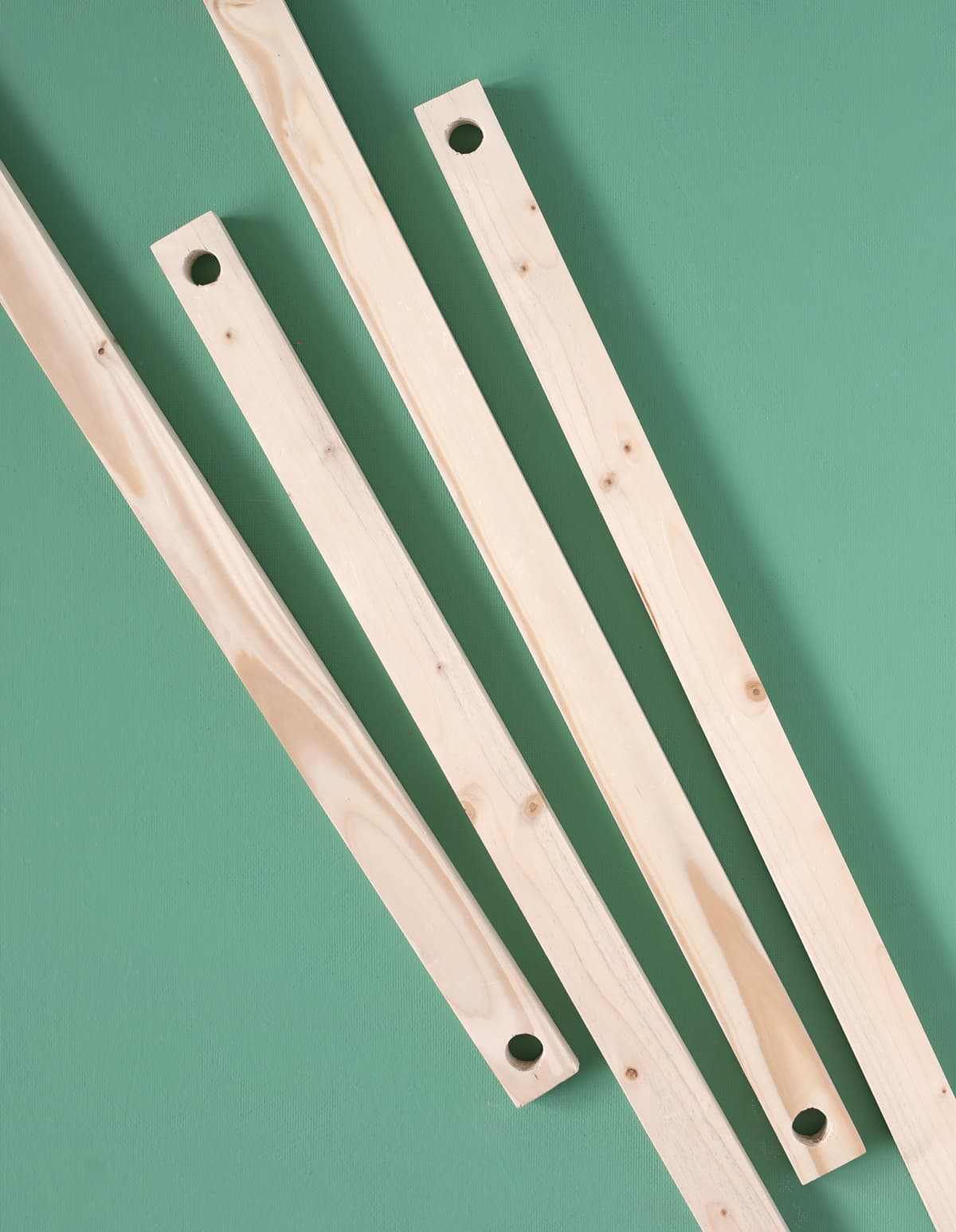 cut 1x2 wood and drill holes